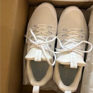 Woman’s White Athletic Shoes